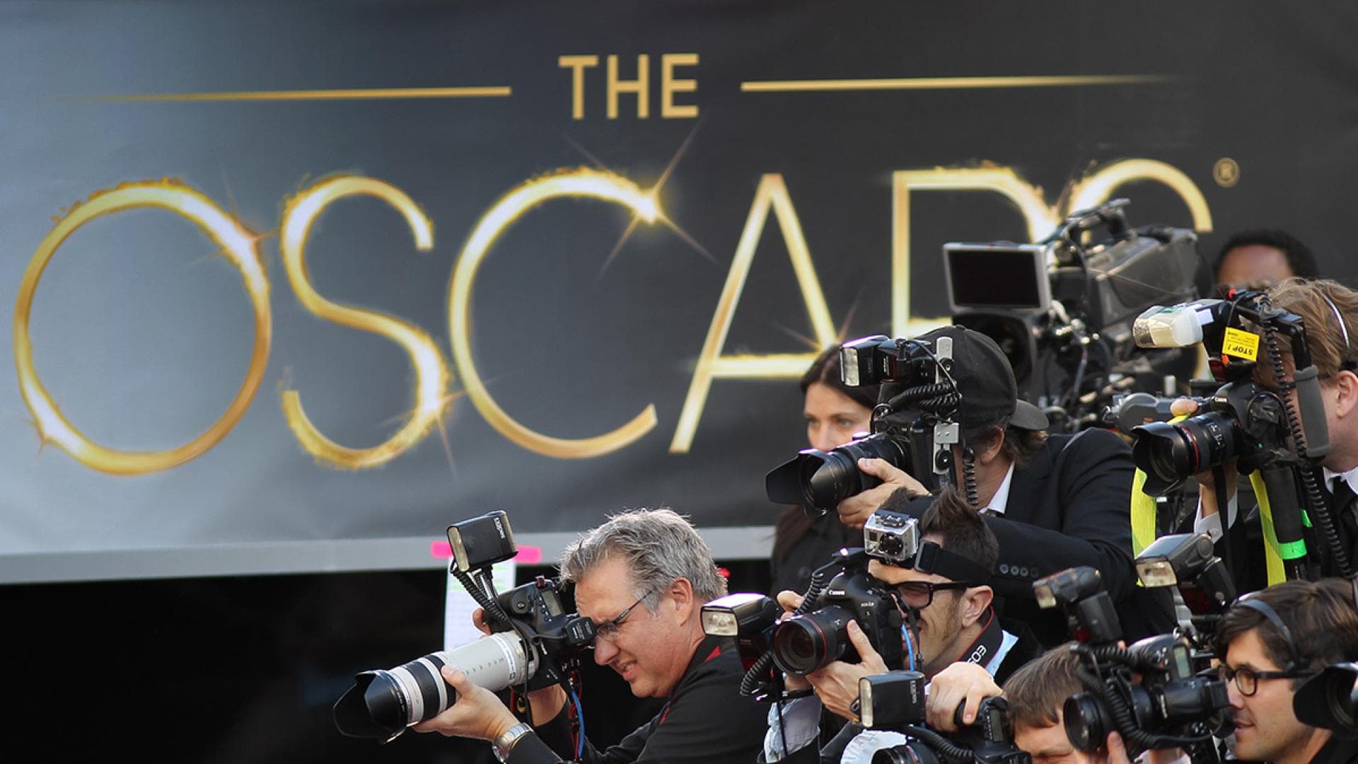 Fotografen vor Oscars Wand