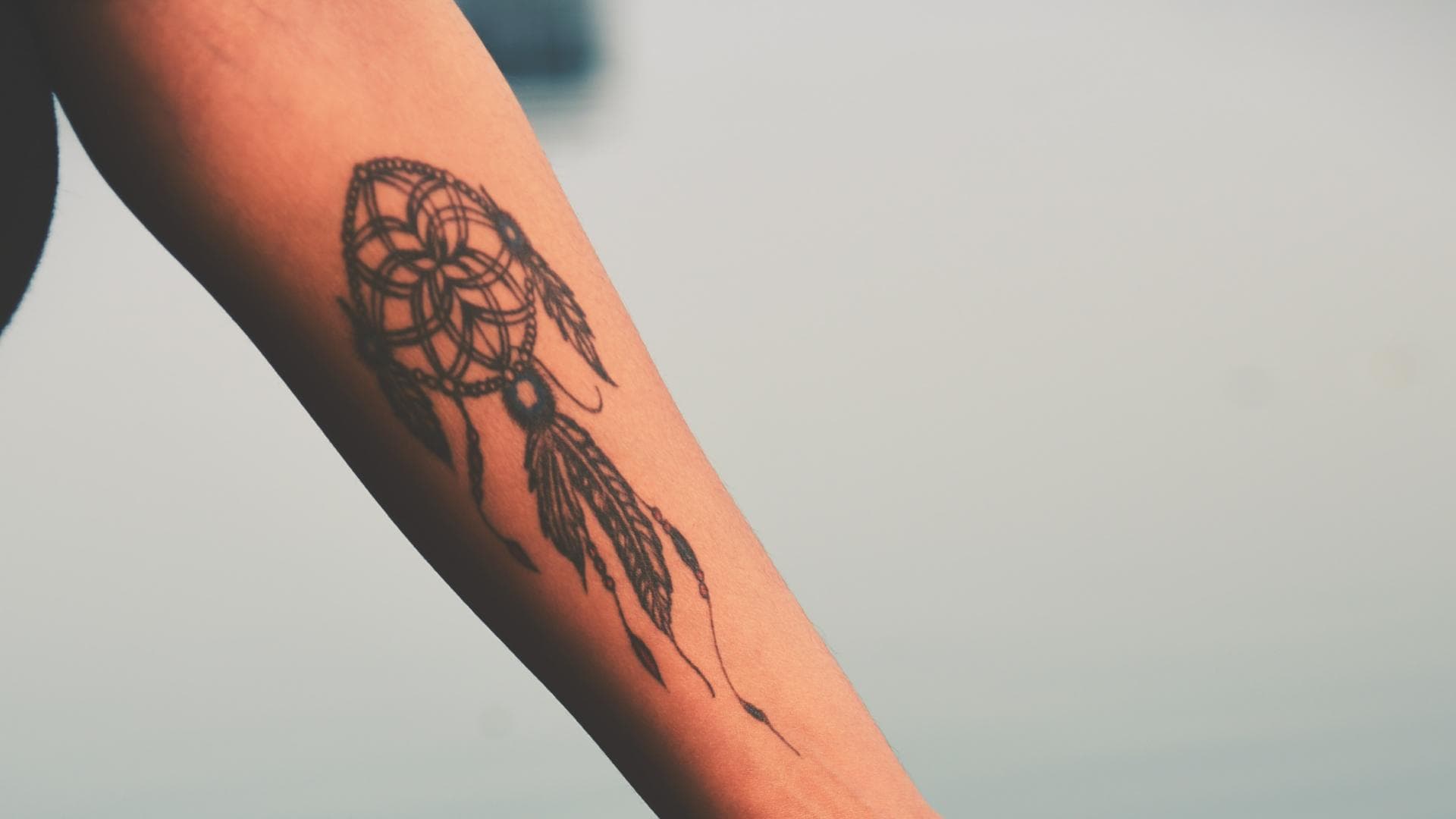 Traumfänger-Tattoo auf Unterarm