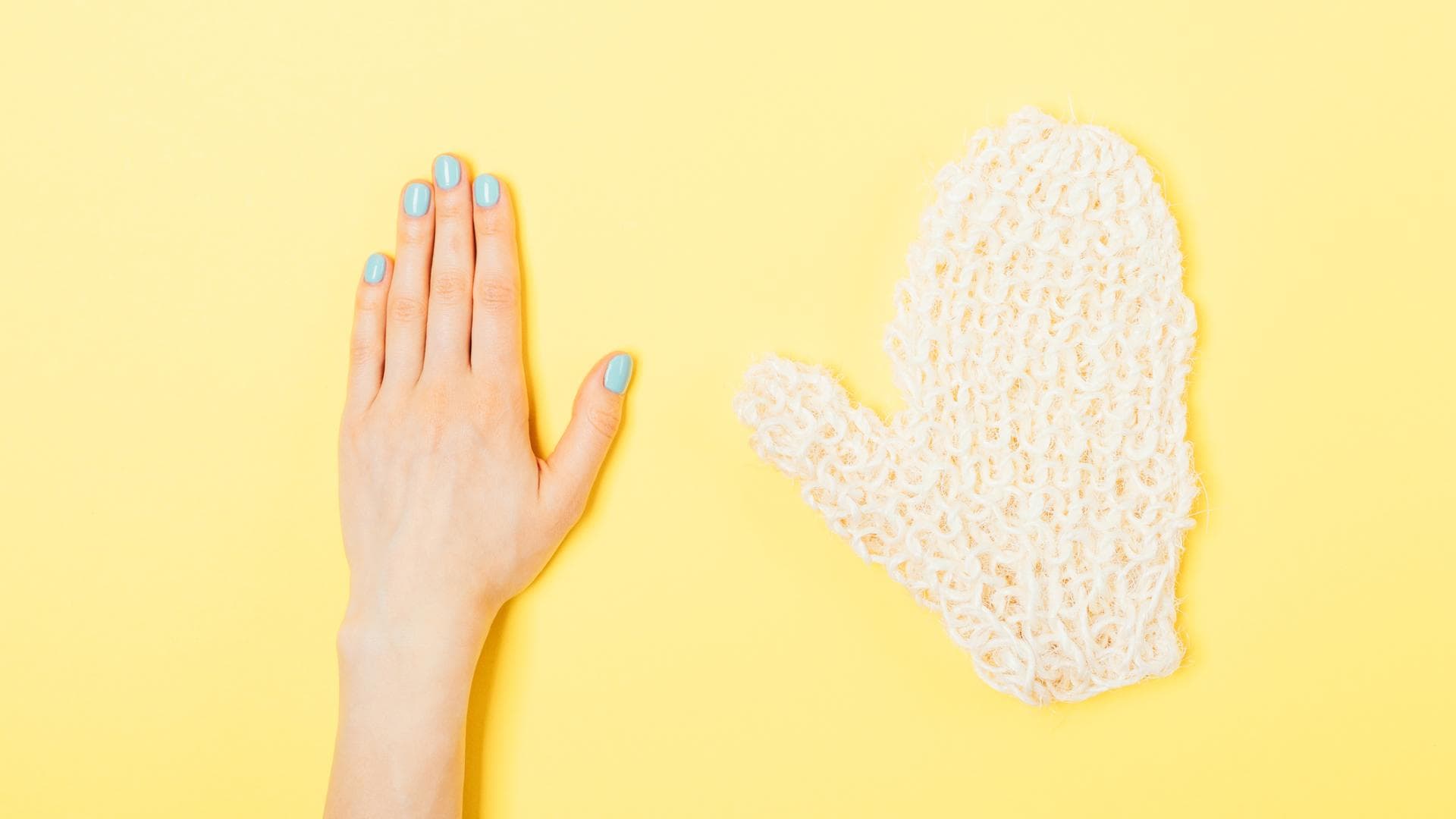 Hand und Peelinghandschuh