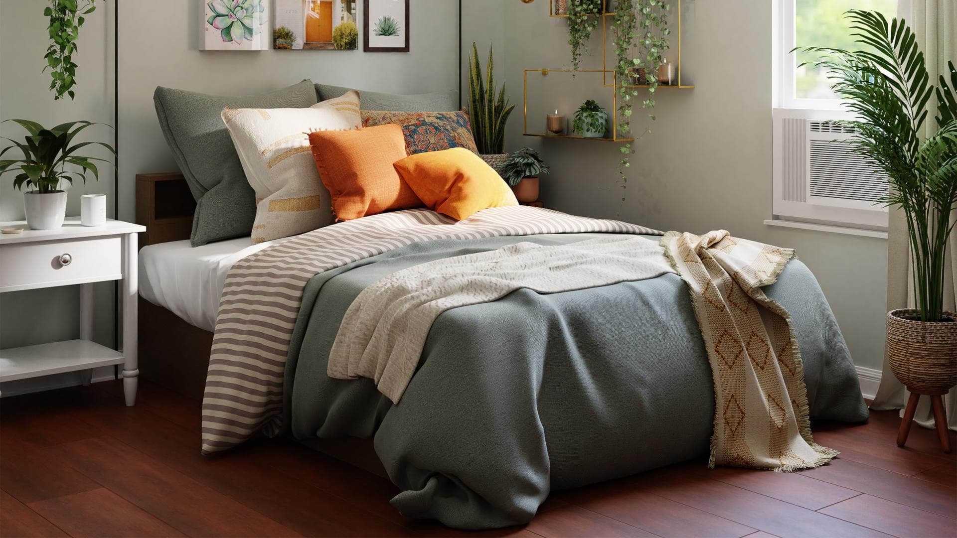 Bett mit orangen Kissen