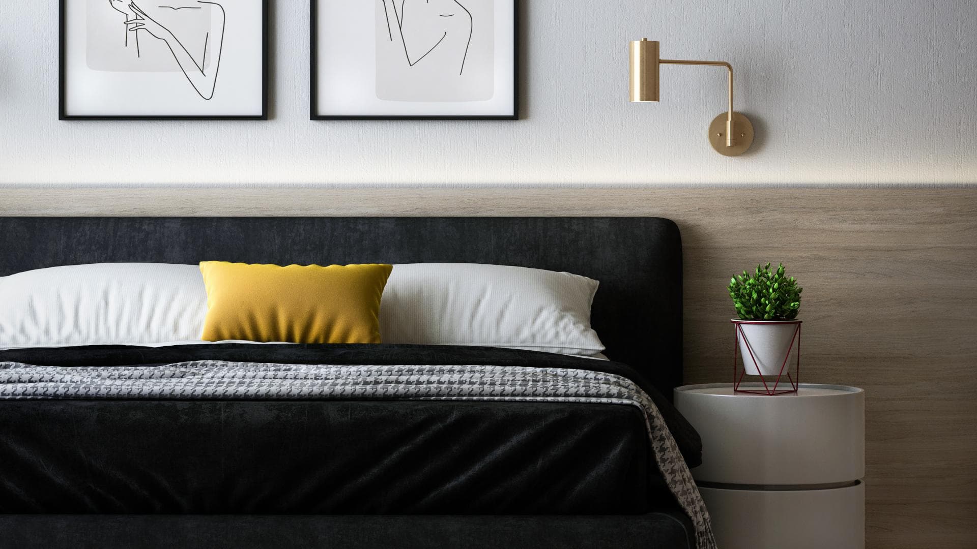 Schalfzimmer mit Bett, Nachttisch und Bildern an der Wand