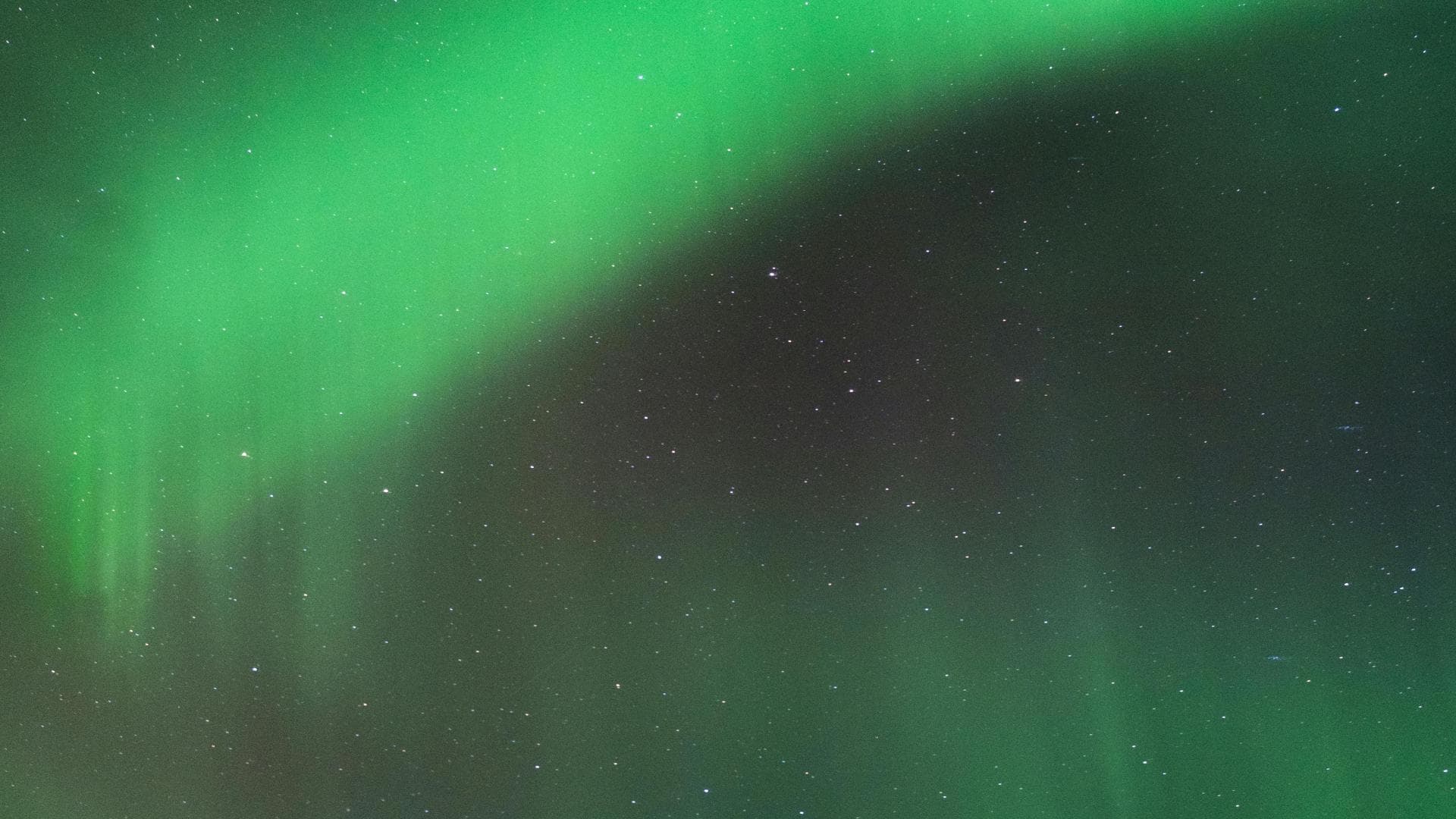 Winterlicher Sternenhimmel mit Polarlichter