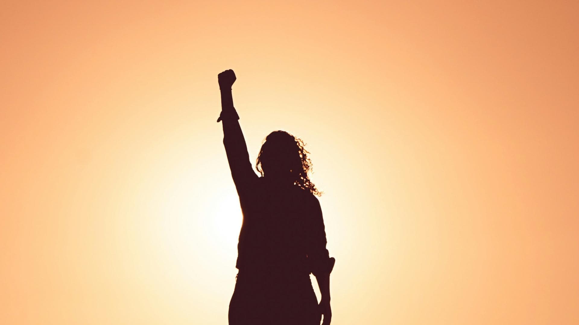 Horoskop: Frau in Siegerpose