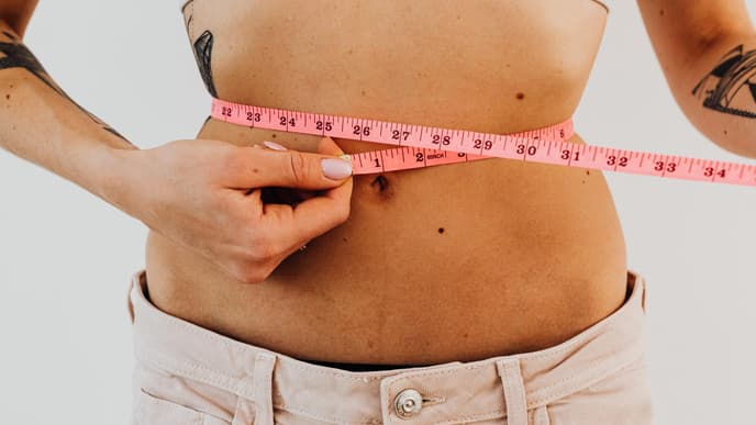 Bauch mit Maßband