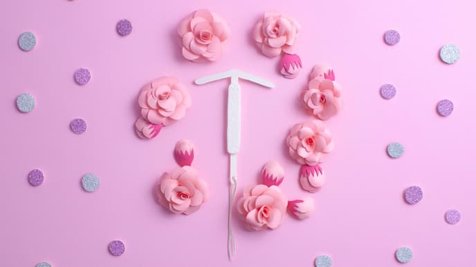 Hormonspirale und Rosen