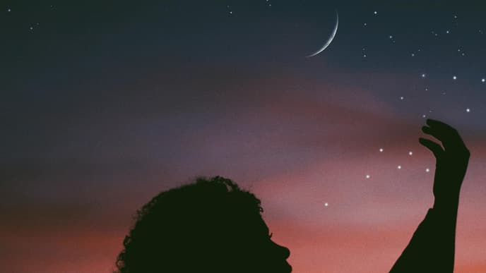 Horoskop Thema: Schatten einer Frau vor einer Mondsichel