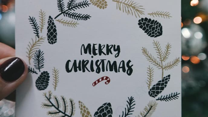 Weihnachtskarte mit "Merry Christmas"-Aufschrift