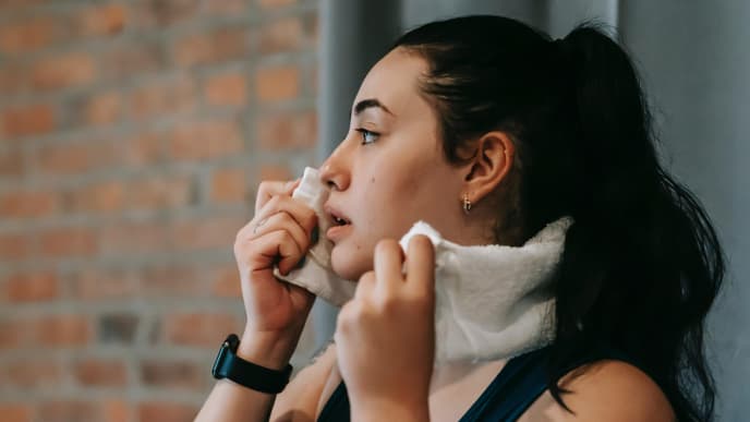 Frau mit Zopf beim Sport