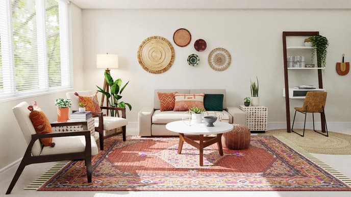 Gemütliches Wohnzimmer mit Sofa, Couchtisch und großem Teppich