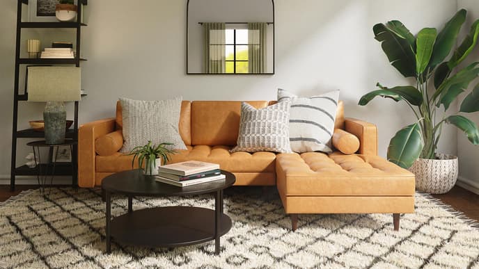 Wohnzimmer mit orangefarbener Couch
