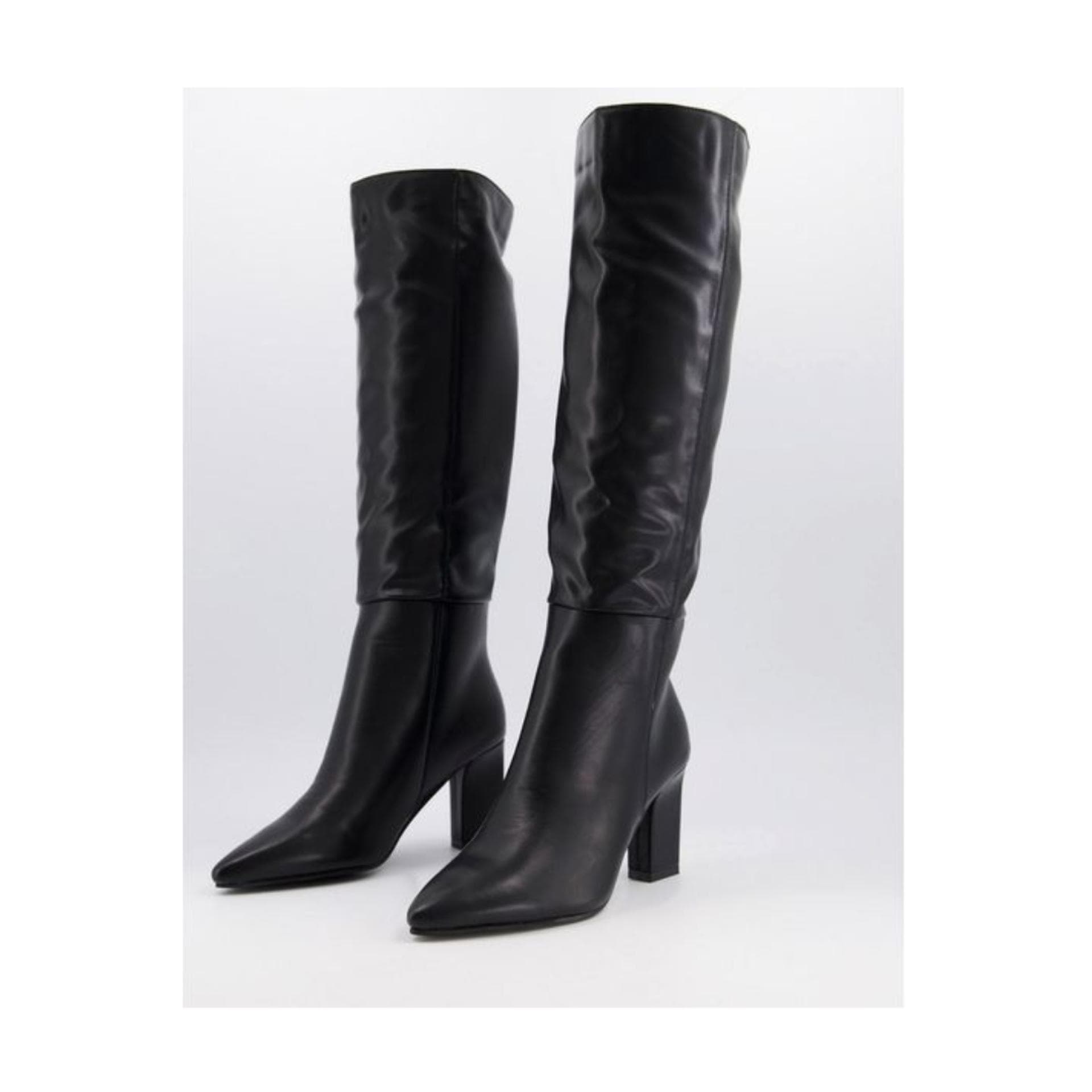 Schwarze Stiefel mit Absatz Schwarze Stiefel mit Absatz