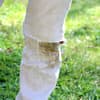 Grasflecken auf weißer Jeans
