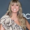 Heidi Klum lächelt