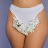Frau mit Blumen an Vagina