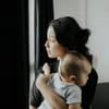Frau mit Baby
