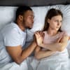 Frustriertes Paar im Bett