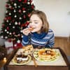 Frau isst Frühstück