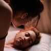 Mann und Frau im Bett
