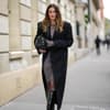 Camille Charriere im Mantel