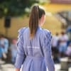 Frau mit Zopf