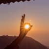 Sonne und Hand