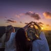 Sonnenuntergang und 3 Frauen