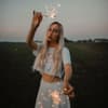 Horoskop: Frau mit Wunderkerze