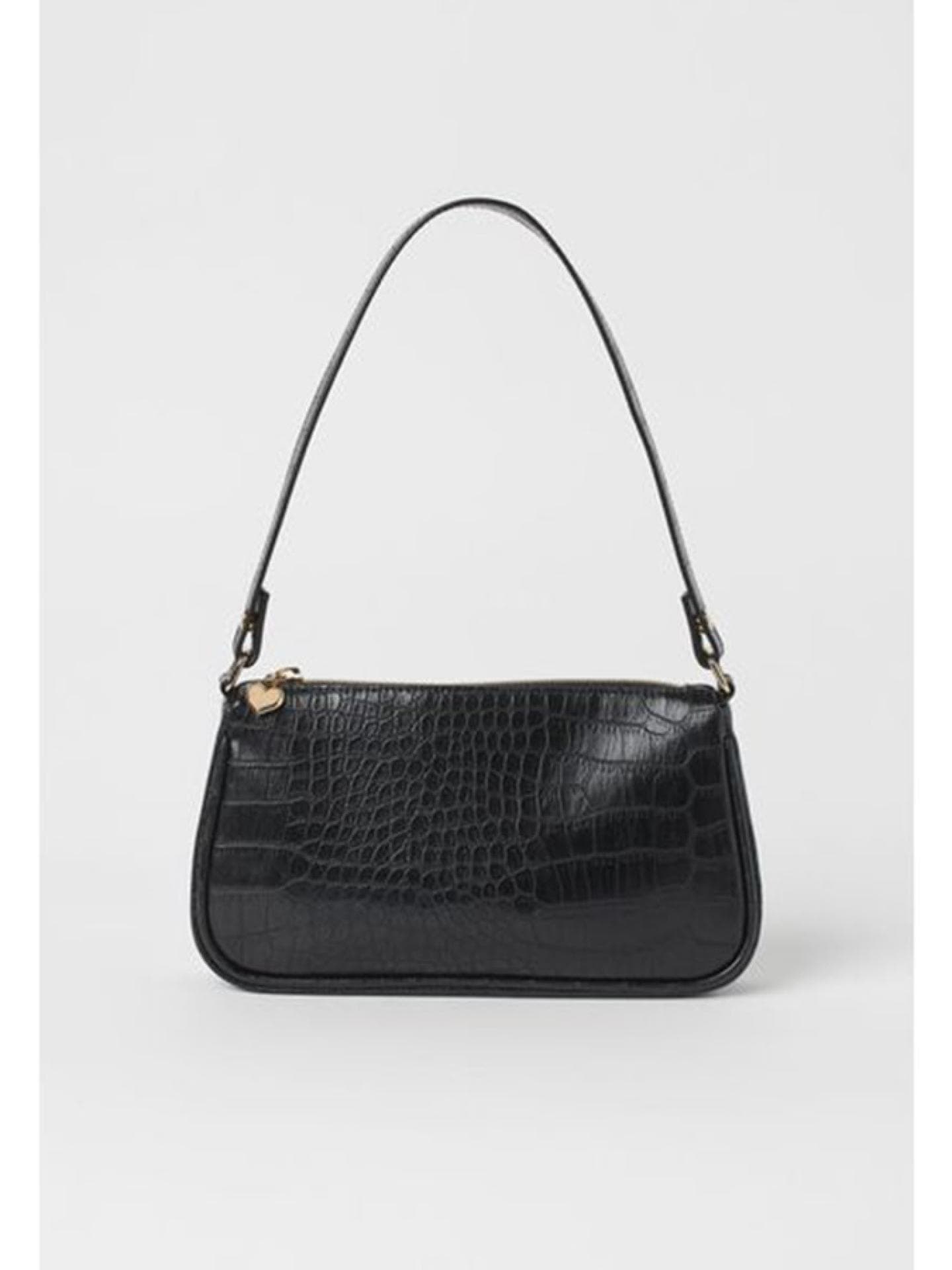 Schwarze Tasche mit Kroko-Optik