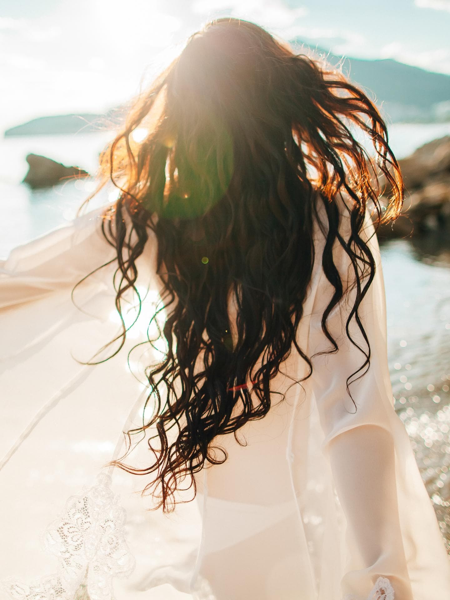 Frau mit glänzenden Haaren