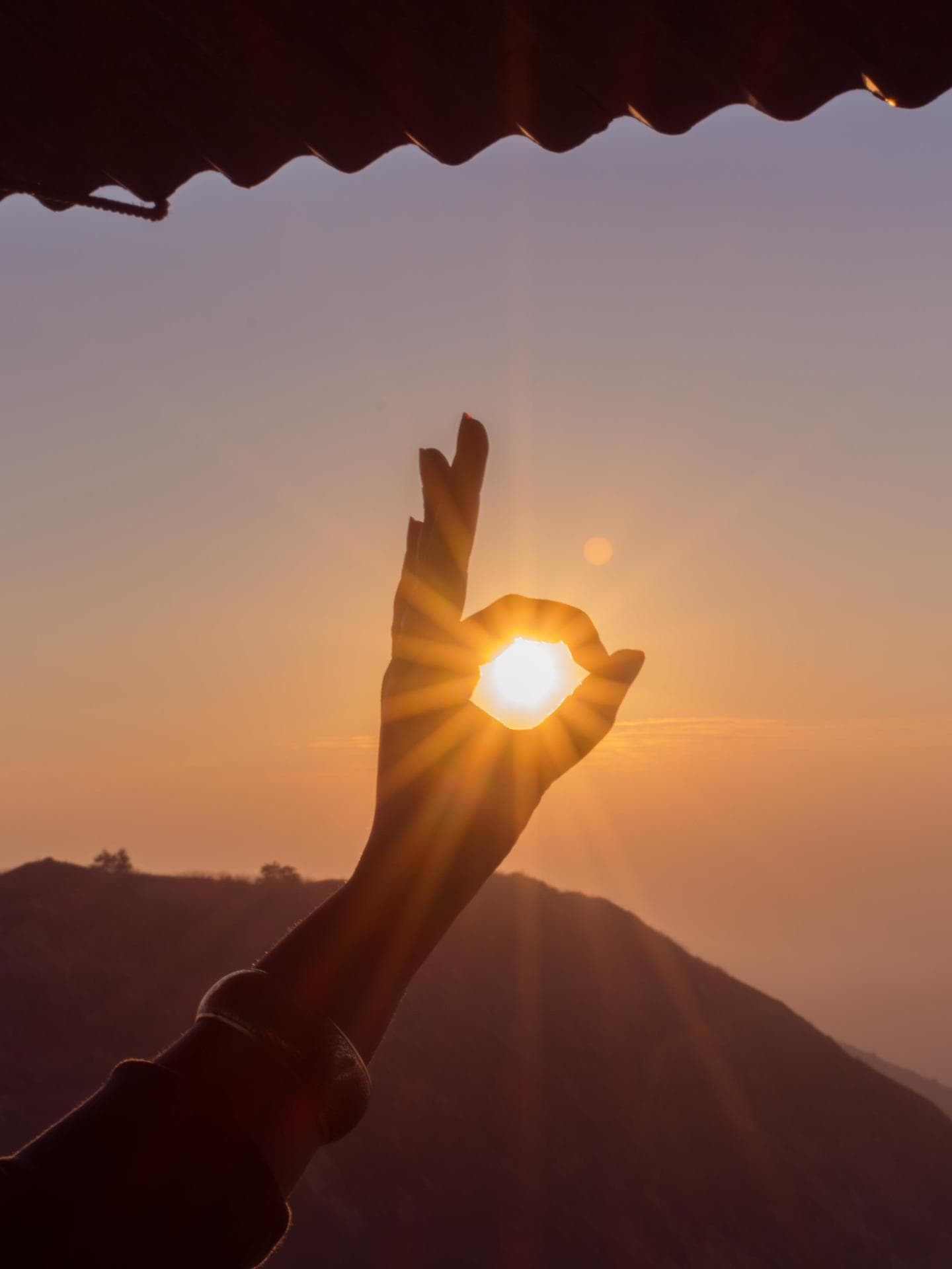 Sonne und Hand