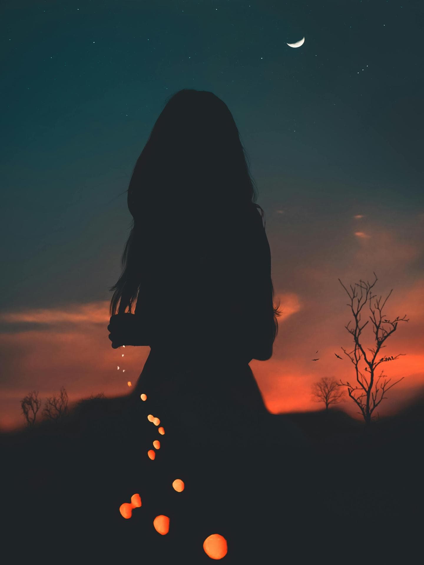 Silhouette einer Frau vor einem Sternenhimmel