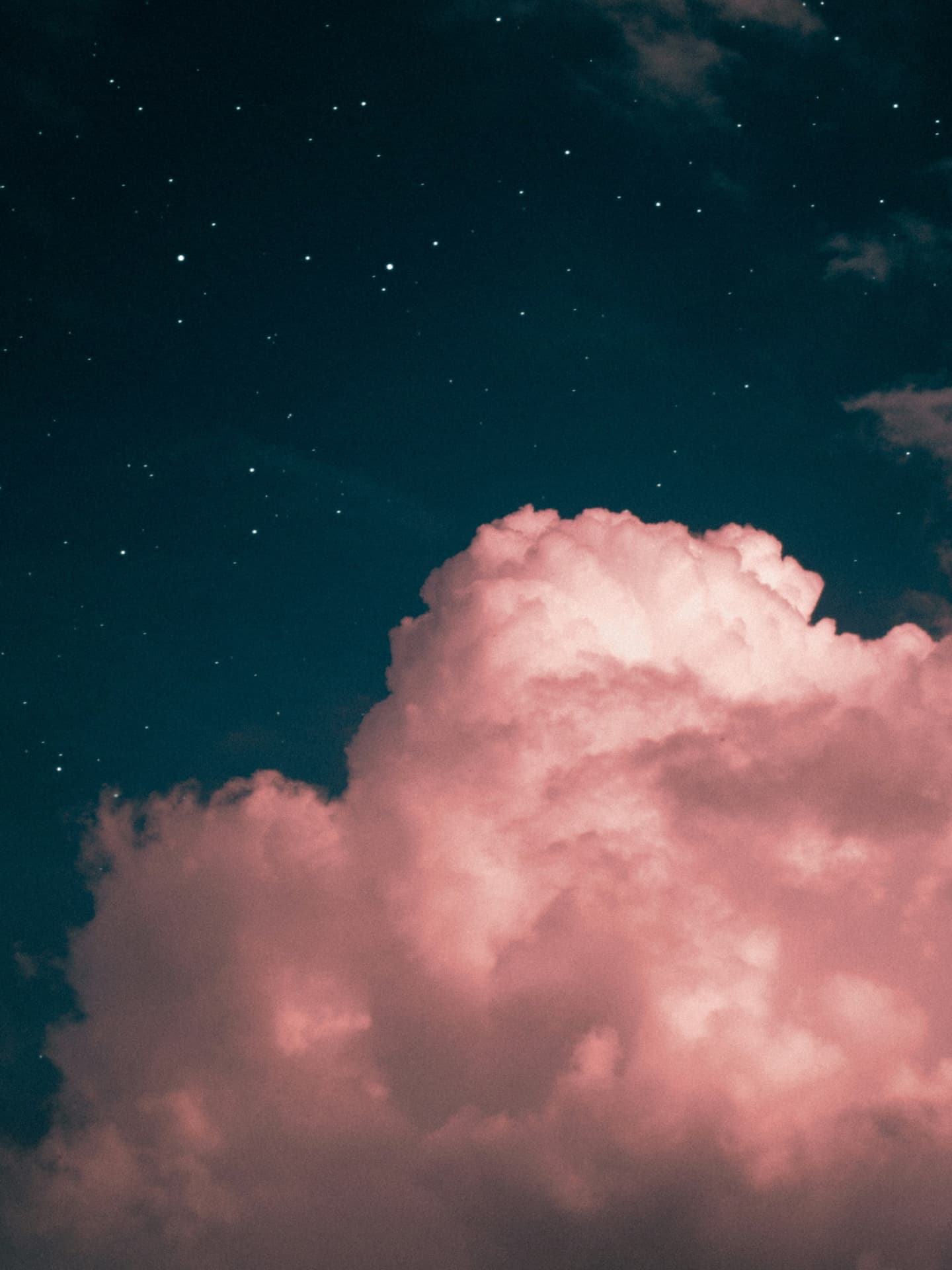 Sternenhimmel mit rosa Wolke