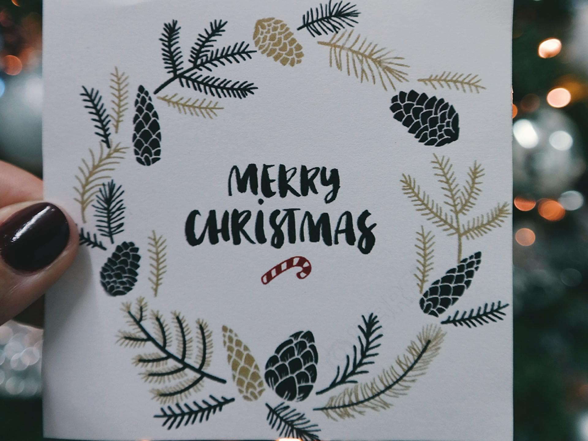 Weihnachtskarte mit "Merry Christmas"-Aufschrift