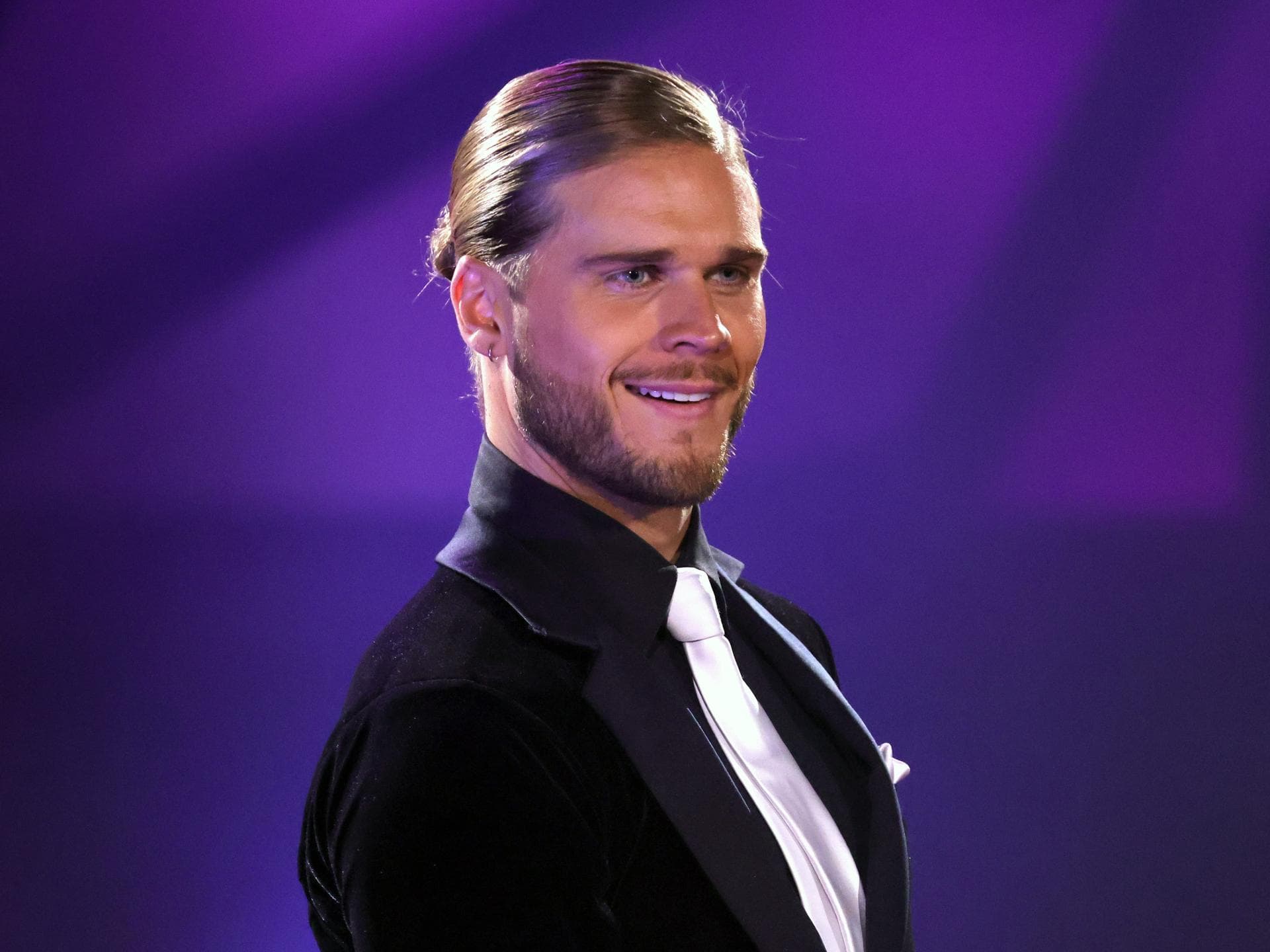Rurik Gislason lächelt