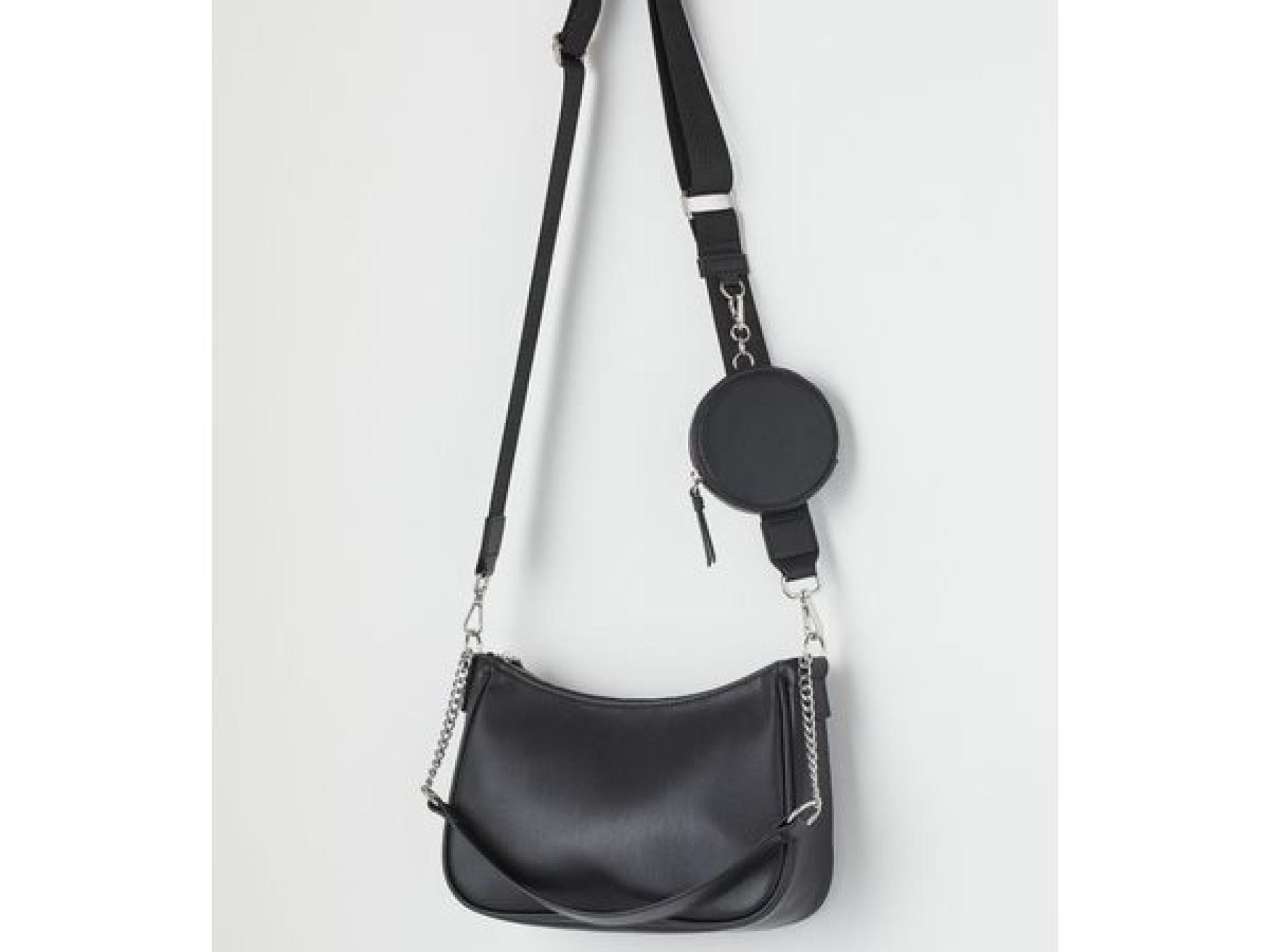 Schwarze Tasche mit Geldbörse