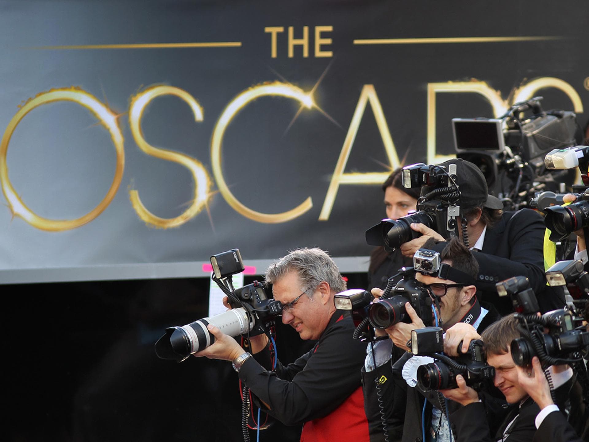 Fotografen vor Oscars Wand