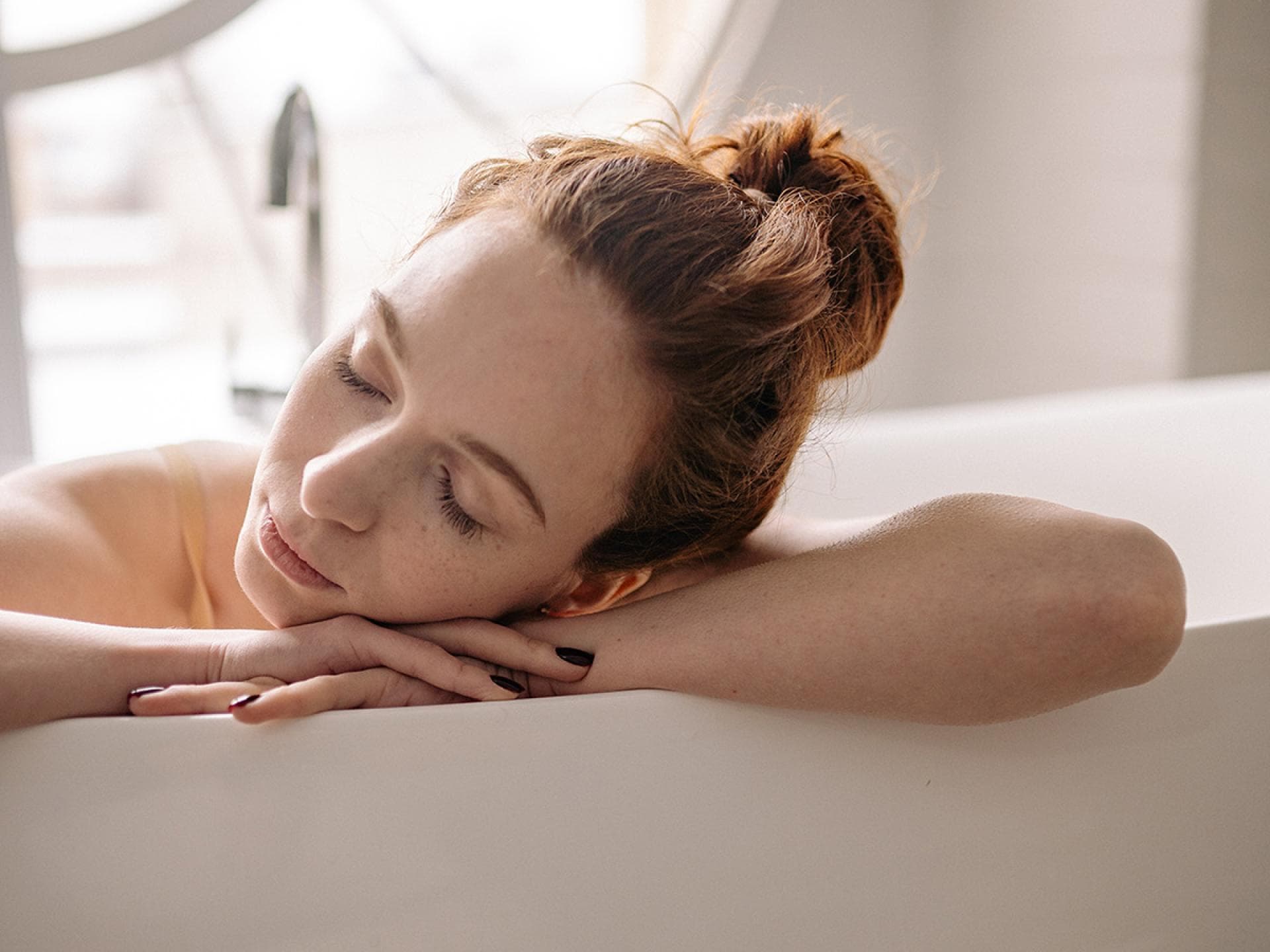 Frau in einer Badewanne