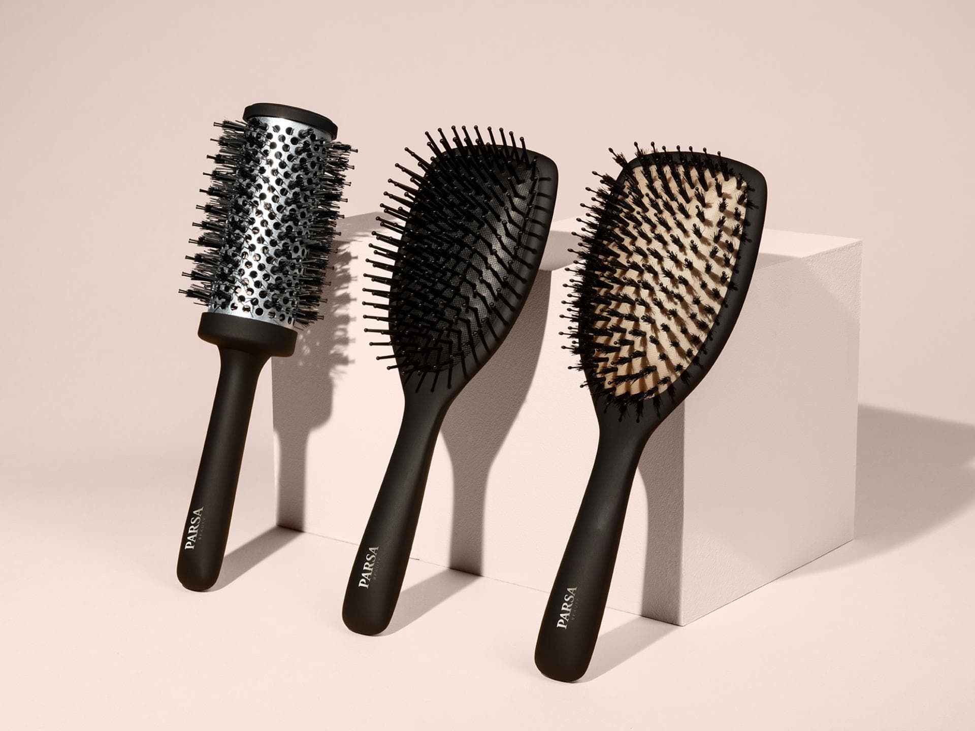 3 verschiedene Parsa Beauty Paddlebürsten