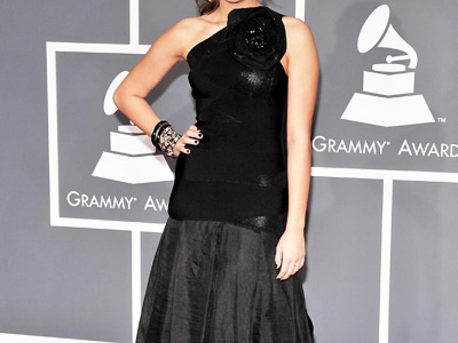 Miley Cyrus in Hervé Léger by Max Azria