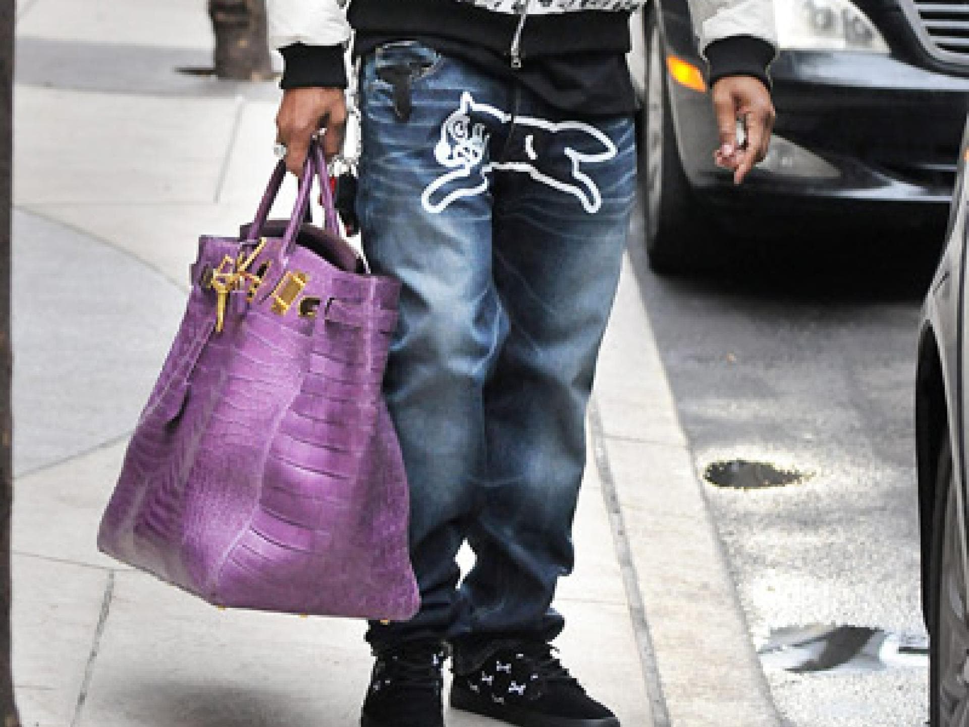 Pharrell Williams mit Birkin-Bag von Hermès