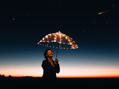 Frau mit Regenschirm vor Sternhimmel