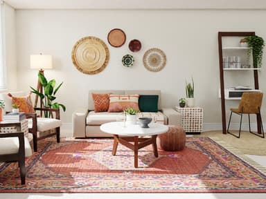 Gemütliches Wohnzimmer mit Sofa, Couchtisch und großem Teppich